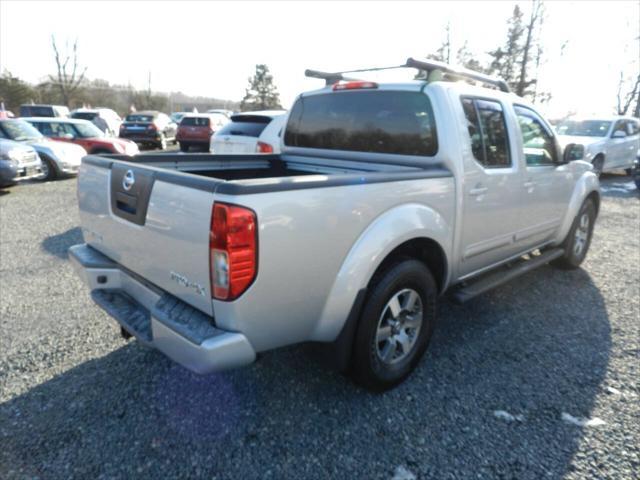 used 2011 Nissan Frontier car, priced at $12,000