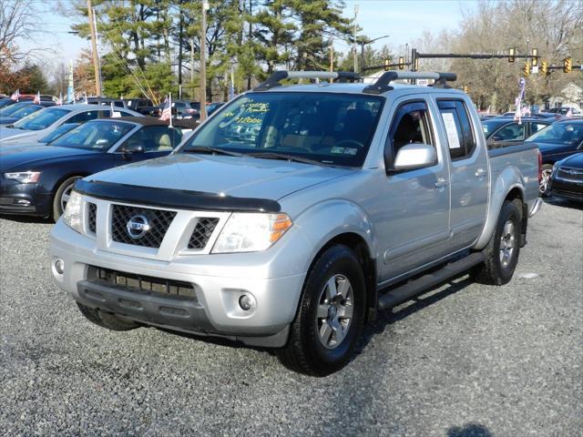 used 2011 Nissan Frontier car, priced at $12,000