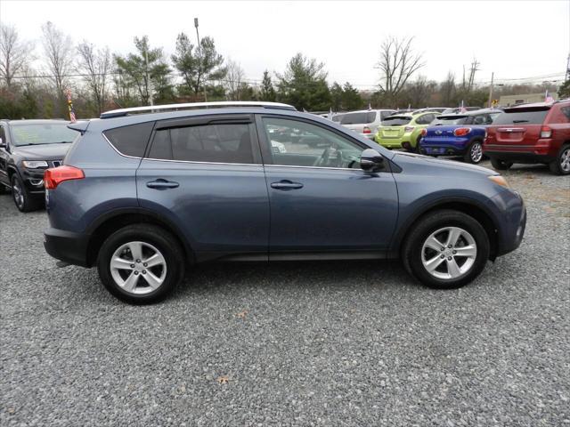 used 2014 Toyota RAV4 car, priced at $14,000