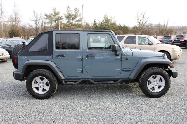 used 2015 Jeep Wrangler Unlimited car, priced at $13,900