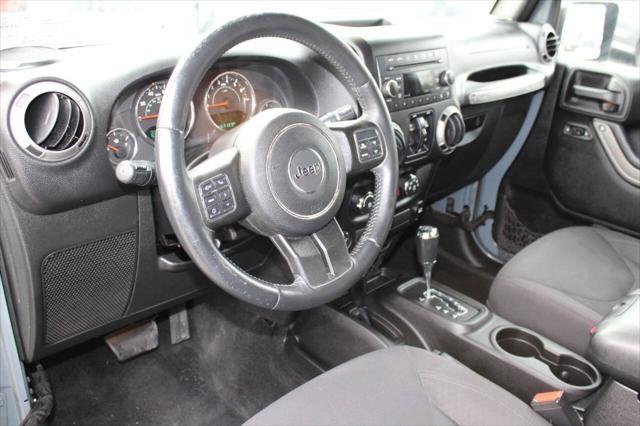 used 2015 Jeep Wrangler Unlimited car, priced at $13,900