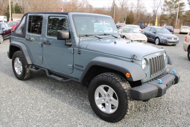 used 2015 Jeep Wrangler Unlimited car, priced at $13,900