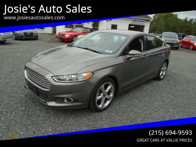 used 2014 Ford Fusion car, priced at $6,952