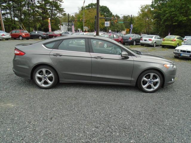 used 2014 Ford Fusion car, priced at $6,952