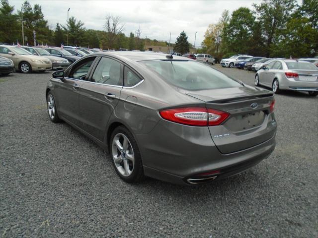 used 2014 Ford Fusion car, priced at $6,952