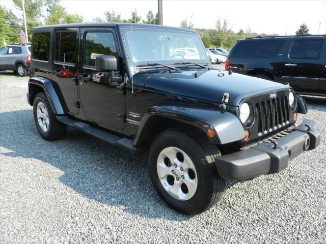 used 2013 Jeep Wrangler Unlimited car, priced at $11,952