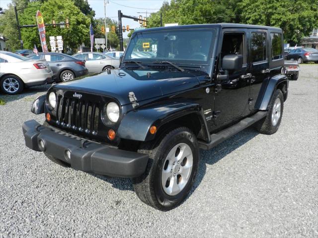 used 2013 Jeep Wrangler Unlimited car, priced at $11,952