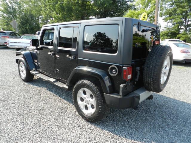 used 2013 Jeep Wrangler Unlimited car, priced at $11,952