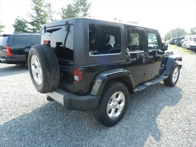 used 2013 Jeep Wrangler Unlimited car, priced at $11,952