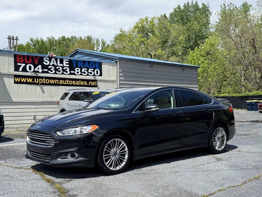 used 2014 Ford Fusion car, priced at $6,995