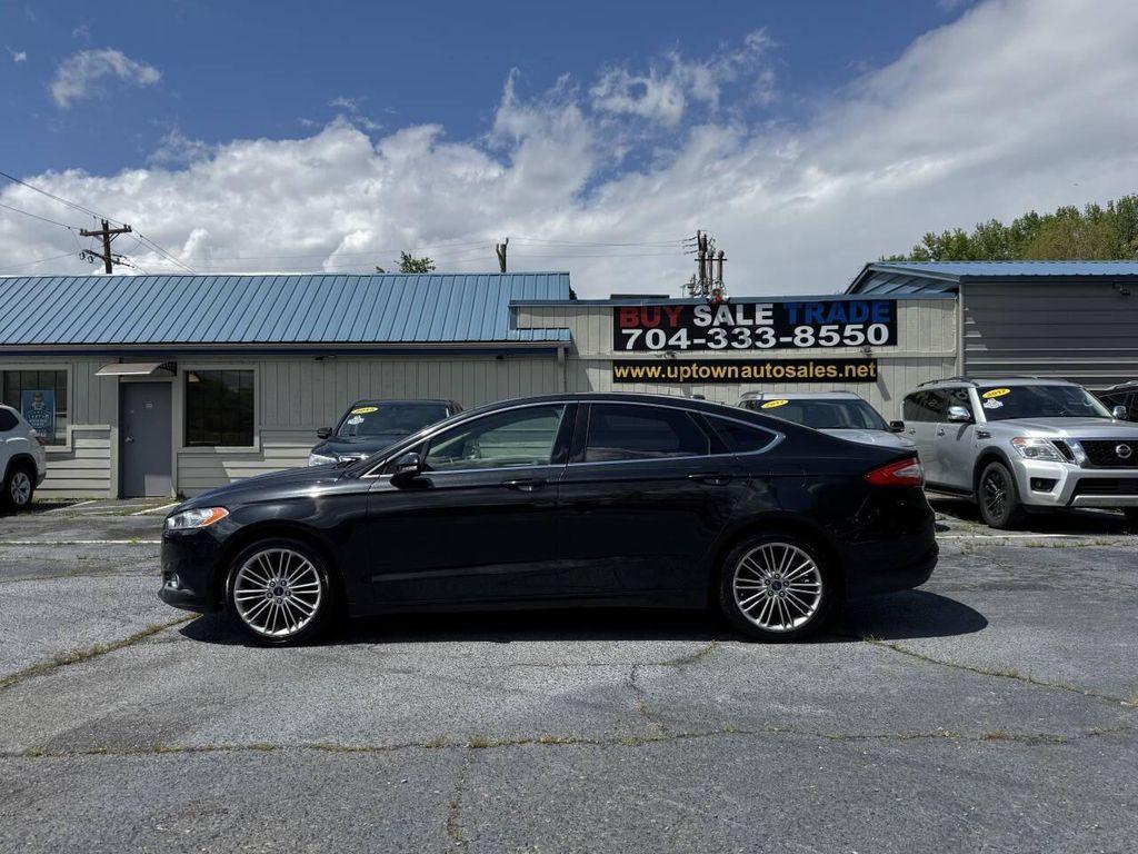 used 2014 Ford Fusion car, priced at $6,995