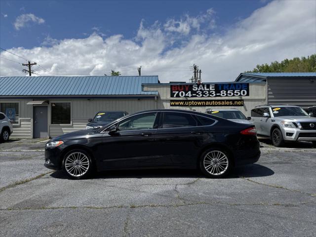 used 2014 Ford Fusion car, priced at $7,995