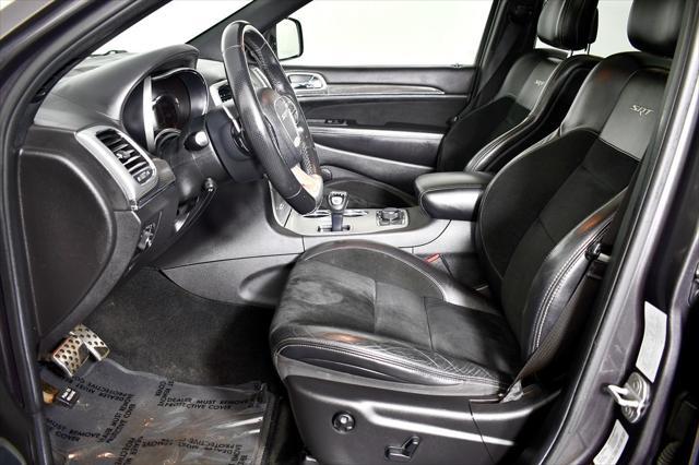 used 2014 Jeep Grand Cherokee car, priced at $29,838