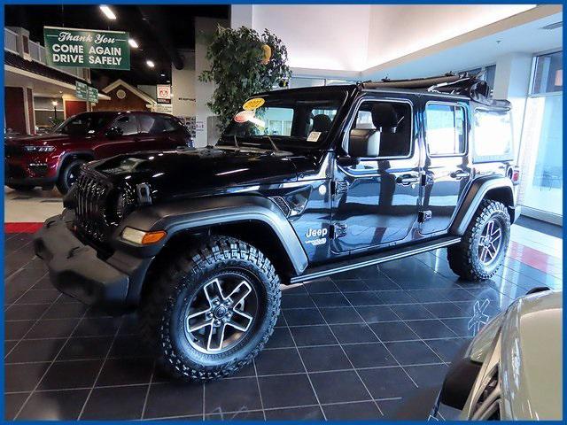 used 2021 Jeep Wrangler Unlimited car, priced at $26,987