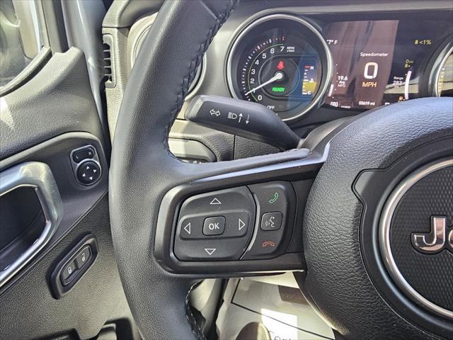 used 2023 Jeep Wrangler 4xe car, priced at $29,699
