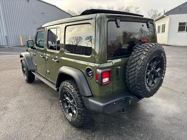 used 2023 Jeep Wrangler car, priced at $39,313