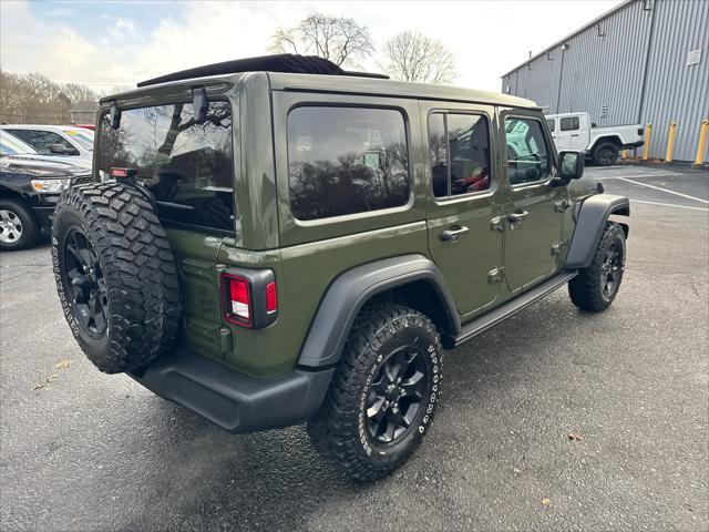 used 2023 Jeep Wrangler car, priced at $39,313