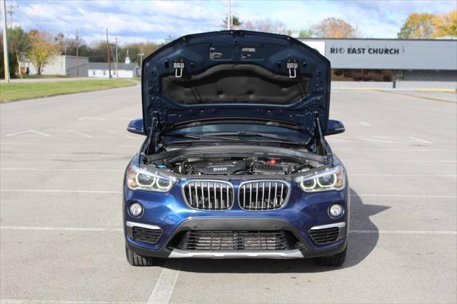 used 2016 BMW X1 car, priced at $13,990