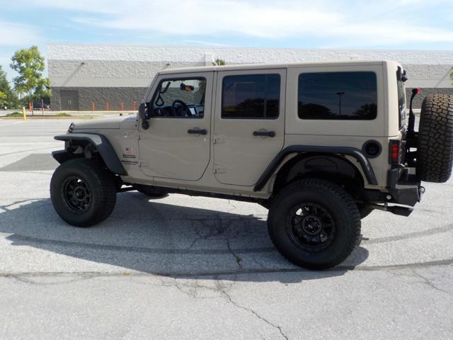 used 2016 Jeep Wrangler Unlimited car, priced at $19,999