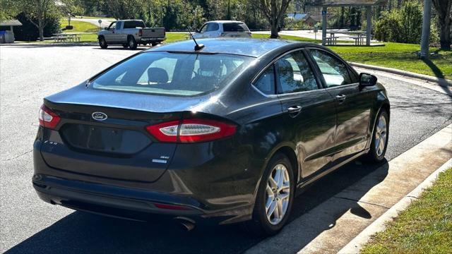 used 2014 Ford Fusion car, priced at $6,990