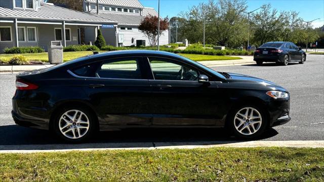 used 2014 Ford Fusion car, priced at $6,990