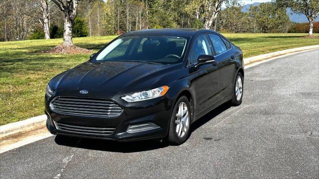 used 2014 Ford Fusion car, priced at $6,990