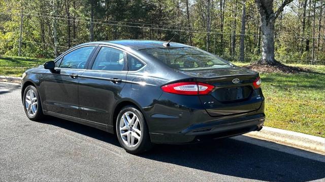 used 2014 Ford Fusion car, priced at $6,990