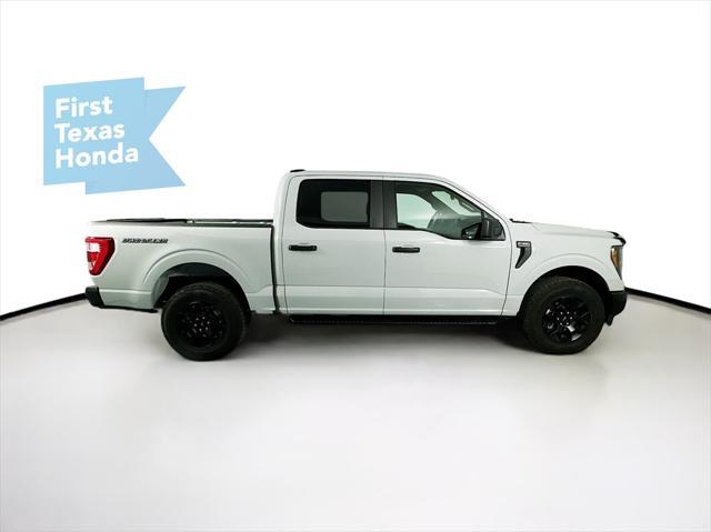 used 2023 Ford F-150 car, priced at $39,219