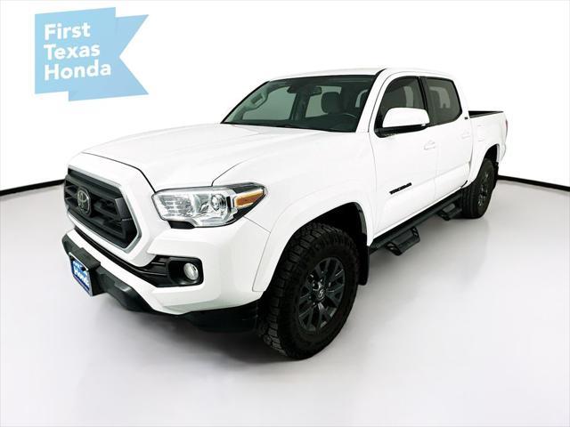 used 2023 Toyota Tacoma car, priced at $30,557