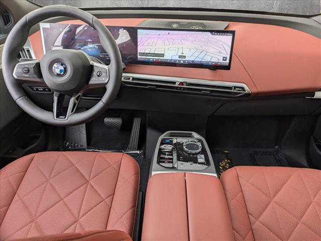 new 2025 BMW iX car, priced at $110,090