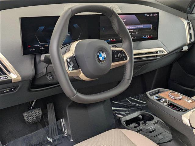 new 2026 BMW iX car, priced at $90,785