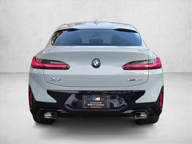 new 2025 BMW X4 car, priced at $67,215