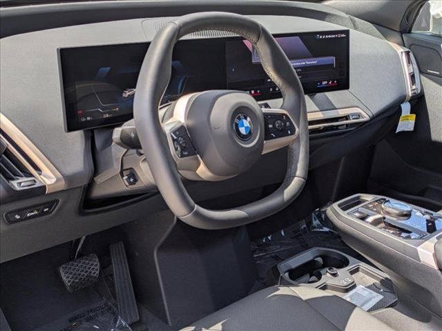 new 2026 BMW iX car, priced at $98,225