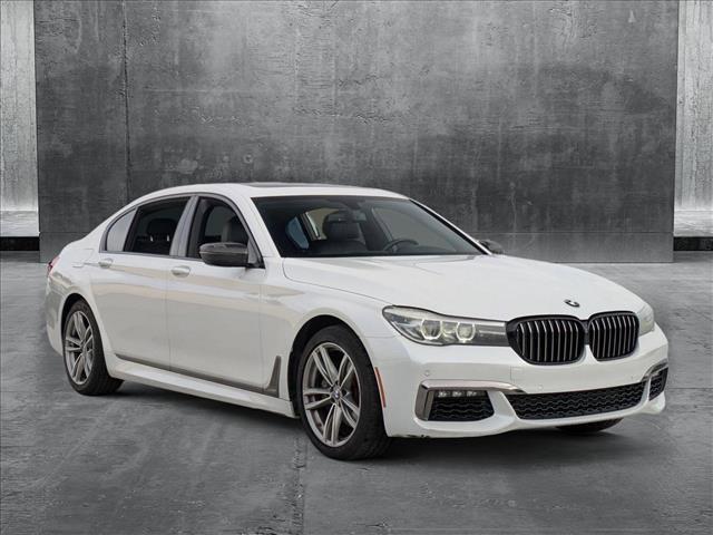 used 2016 BMW 740 car, priced at $16,998