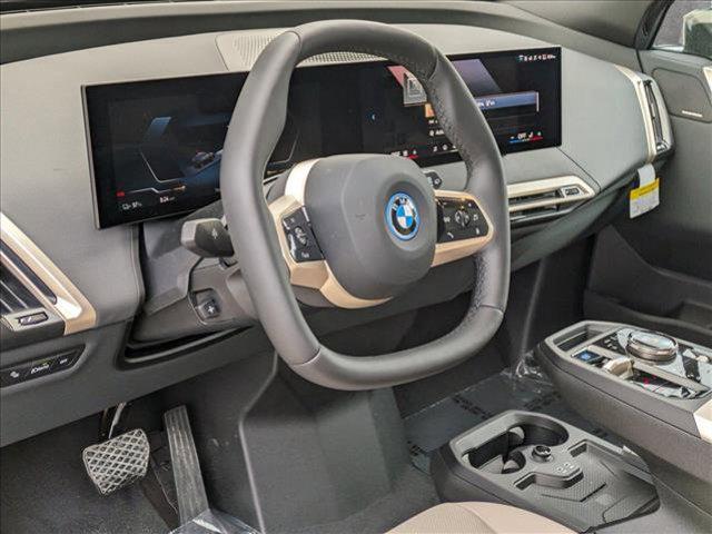 new 2025 BMW iX car, priced at $98,595