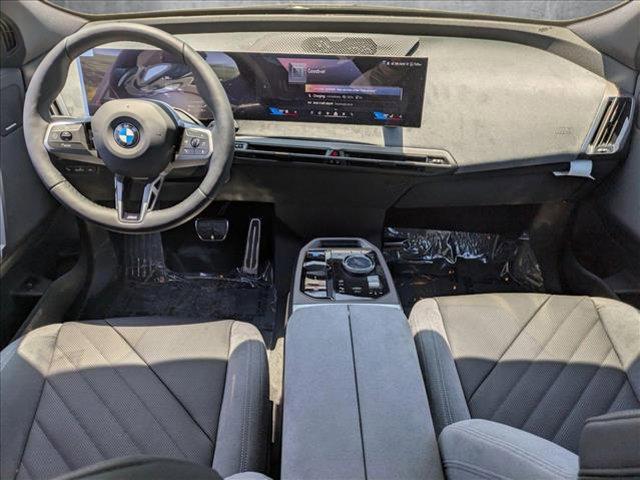 new 2026 BMW iX car, priced at $103,335