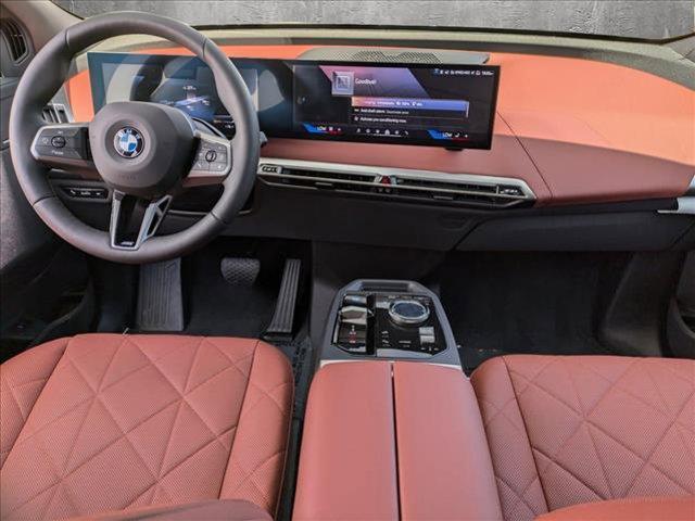 new 2025 BMW iX car, priced at $104,055