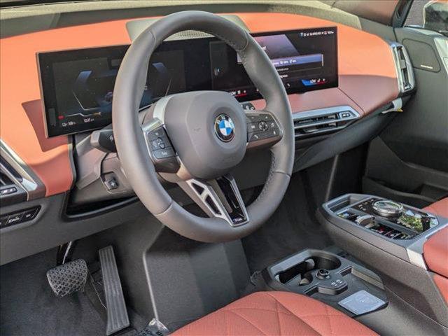 new 2025 BMW iX car, priced at $104,055