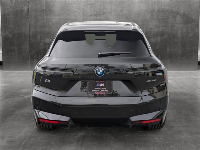 new 2025 BMW iX car, priced at $104,245