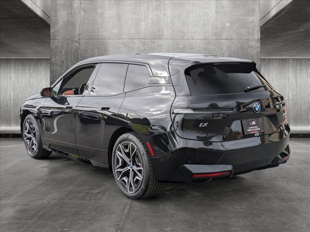 new 2025 BMW iX car, priced at $104,245