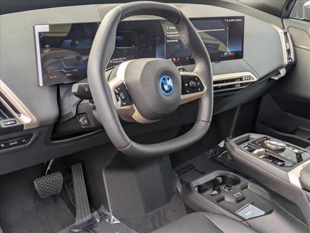 new 2025 BMW iX car, priced at $94,140