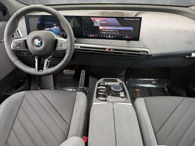new 2026 BMW iX car, priced at $103,525