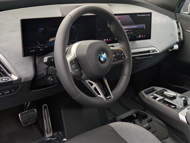 new 2026 BMW iX car, priced at $103,525