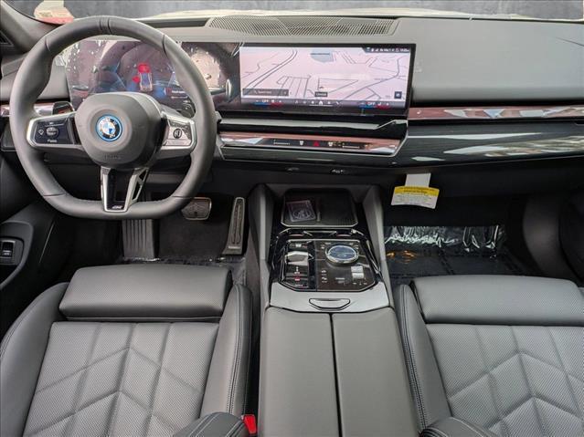 new 2025 BMW 550e car, priced at $77,375