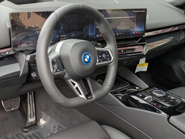 new 2025 BMW 550e car, priced at $77,375