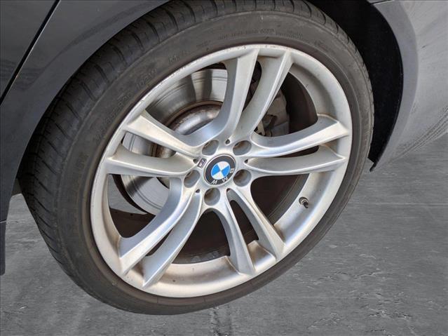 used 2014 BMW 740 car, priced at $12,333