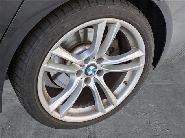 used 2014 BMW 740 car, priced at $13,998