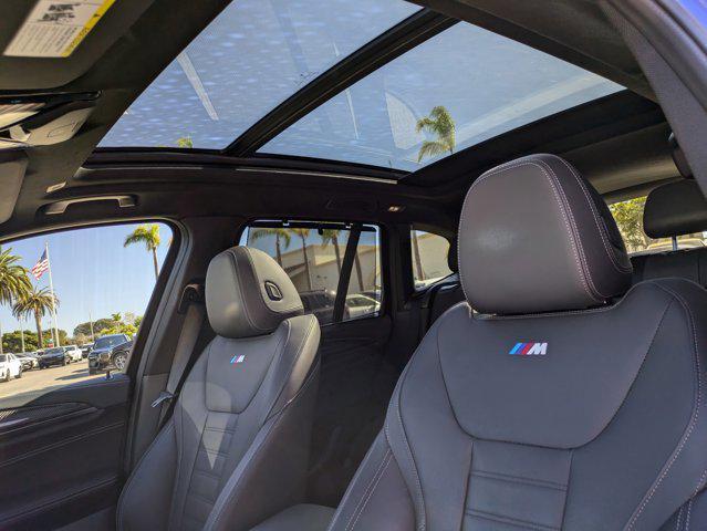 used 2022 BMW X3 M car, priced at $63,291