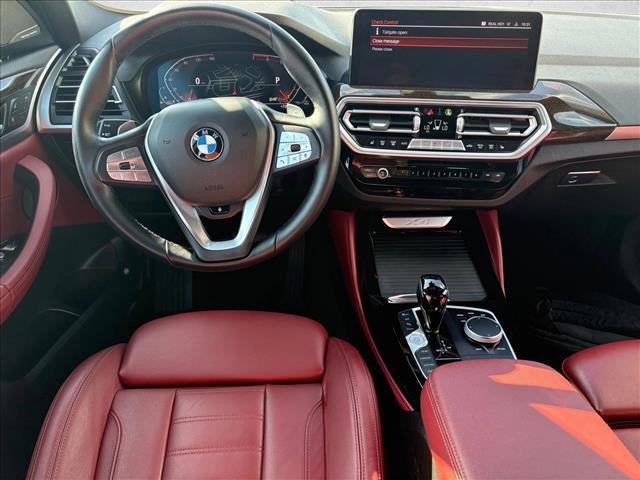 used 2023 BMW X4 car, priced at $37,997