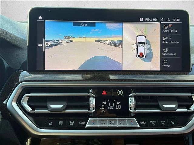 used 2023 BMW X4 car, priced at $37,997